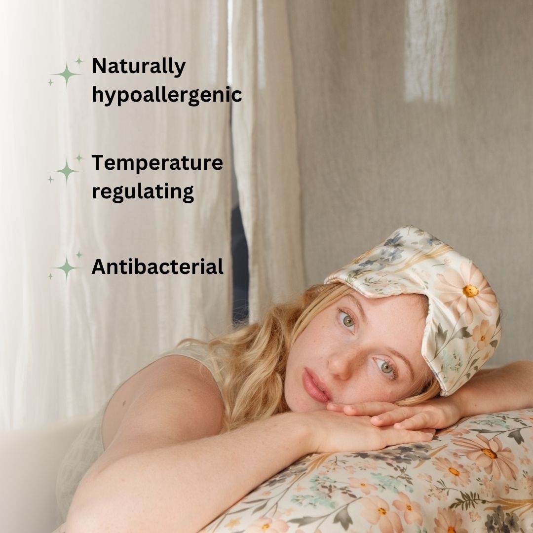 Woman wearing a floral deep sleep mask  with text about product features.