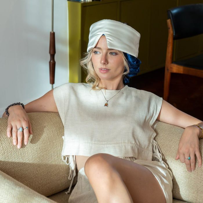 white deep sleep mask and blue silk bonnet 